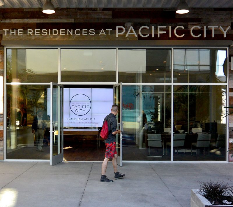 Leasing office for The Residences at Pacific City, showing the video wall as you enter
