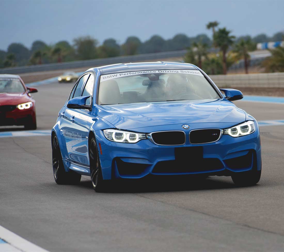 Blue BMW M Series on track at BMW Performance Driving School